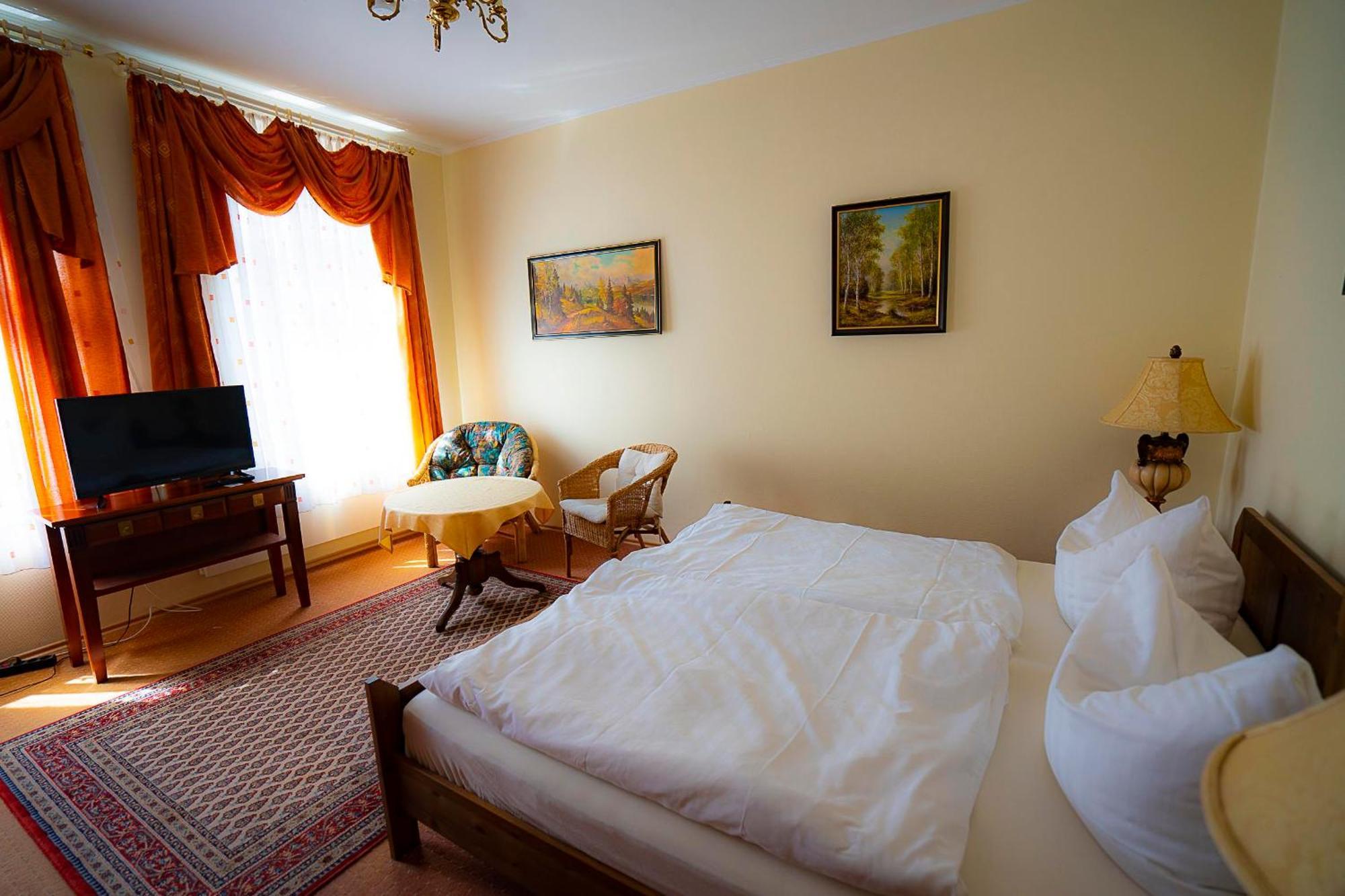Pension Am Dom Шверин Номер фото